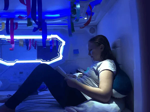 Elaine reading and resting in zPods