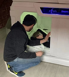 Joseph sleeping in zPods bed