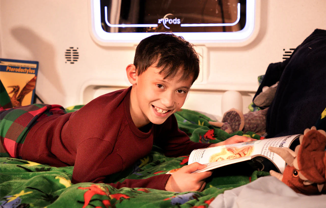 Boy Reading in zPods Bed