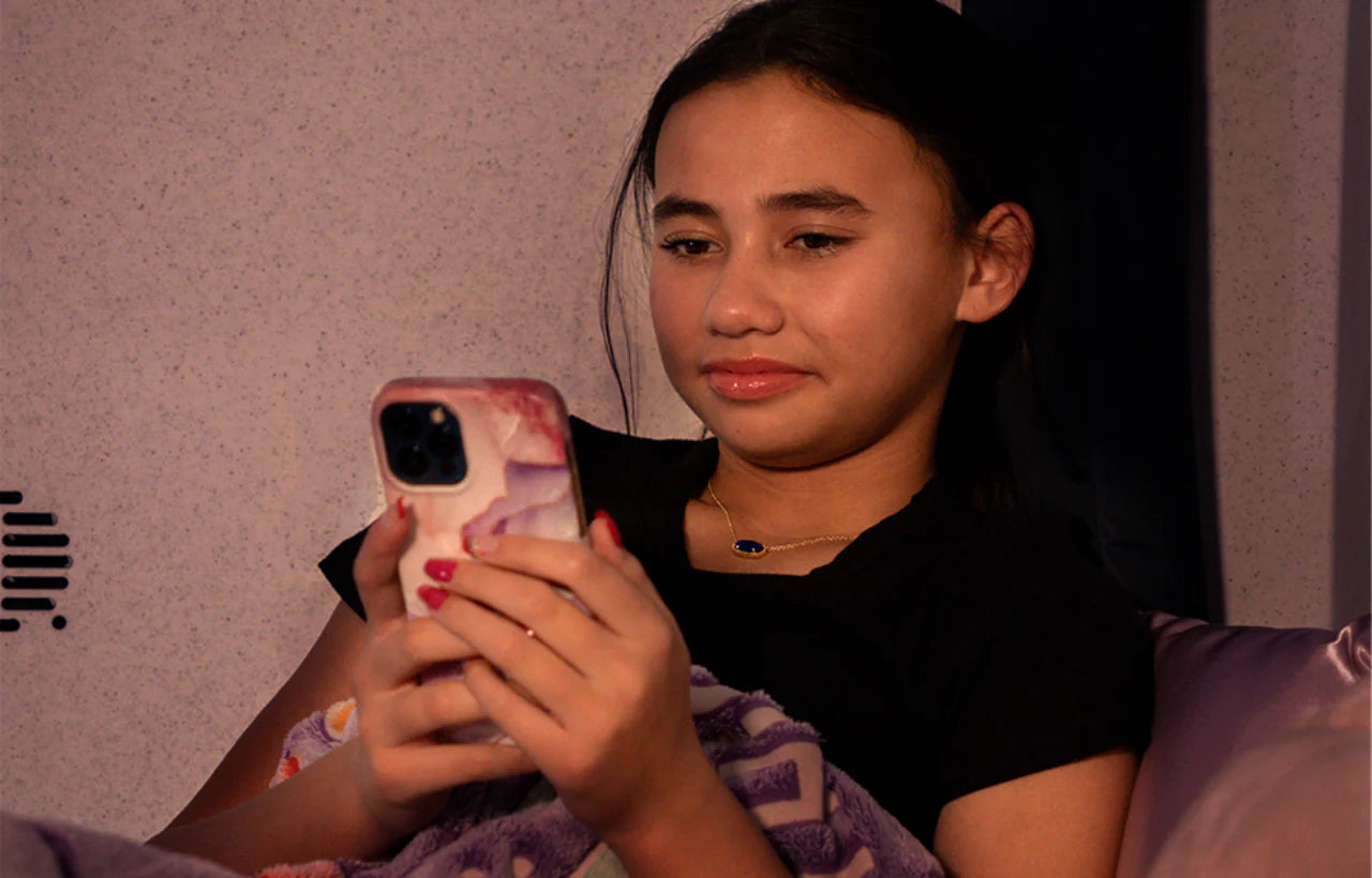 Girl Watching Phone in zPods Bed